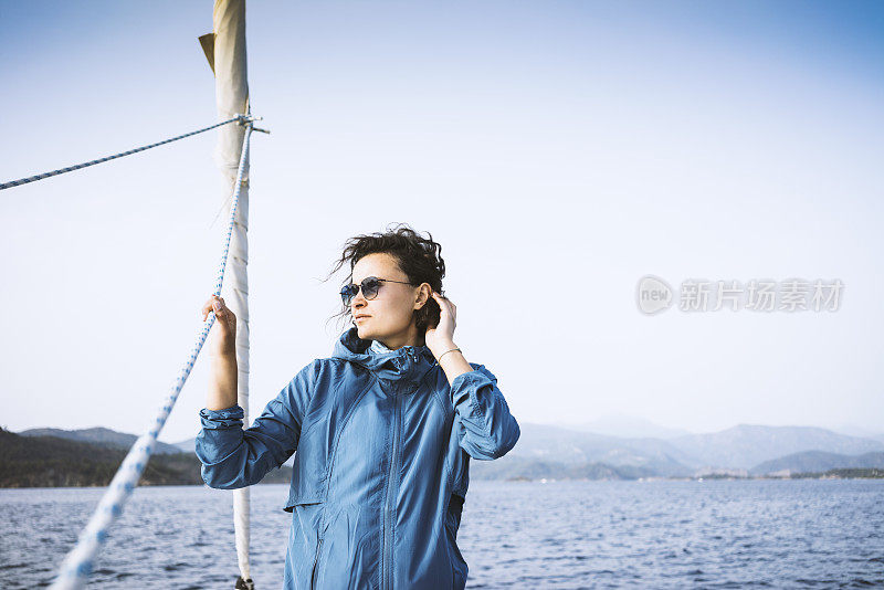 Woman sailing on a windy day